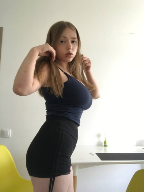 Pretty teen Mia Milkers takes self shots while modelling for a glamour shoot