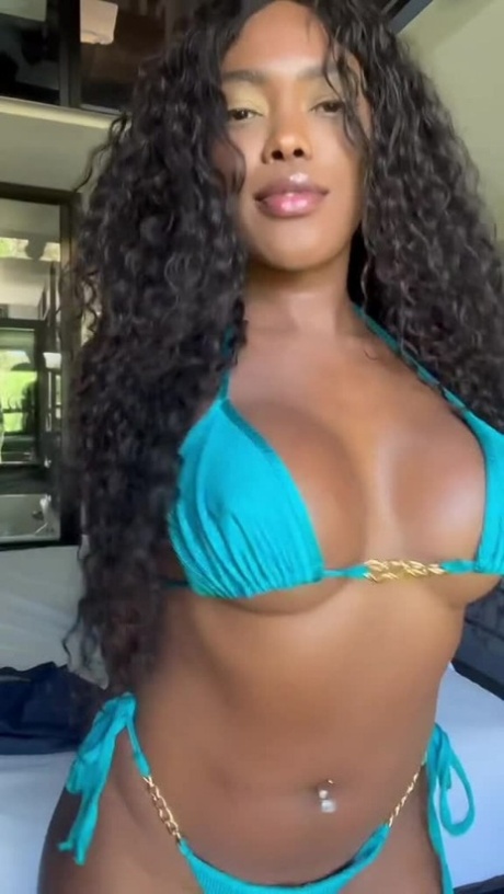 Beautiful curly haired babe shows her big tits in a sexy lingerie compilation