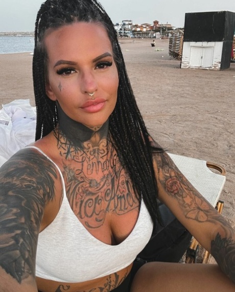 Pretty petite babe takes sexy selfies showing her stunning tattoos