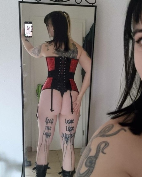 Amateur goth babe Kirajameson poses in her sexy corset and panties
