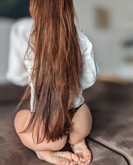 Gorgeous redhead flashes her tiny tits & her hot ass in panties