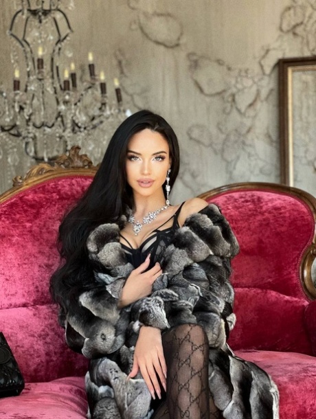 OnlyFans babe Anastasia Vi strips her fur coat & poses in her sexy lingerie