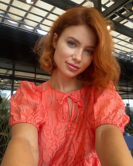 Attractive OnlyFans model Ginger Baby poses seductively in her compilation
