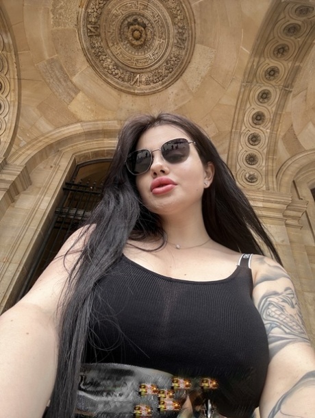 Brunette beauty Patricia Bloom posing provocatively in her public compilation