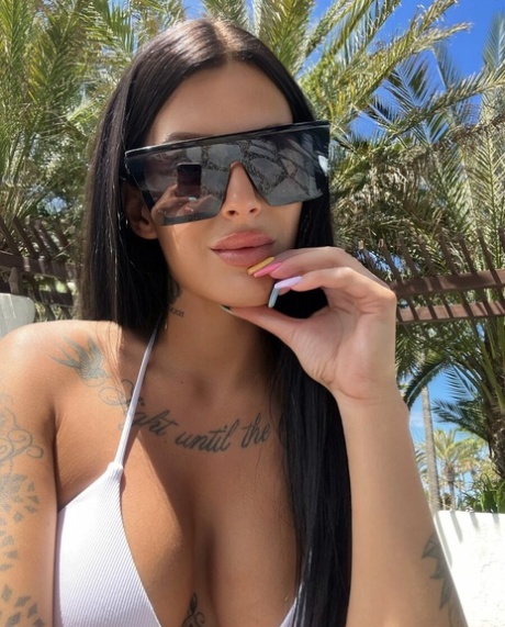 Glamorous babe exposing her incredible inked body in her compilation