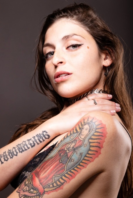 Tattooed brunette model Peque Sanchezz flaunts her amazing bubble butt